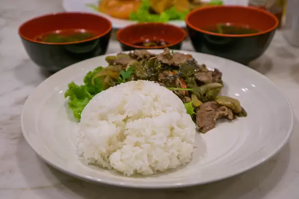 Mustard Pickled Beef with Rice and Soup in Ho Chi Minh City