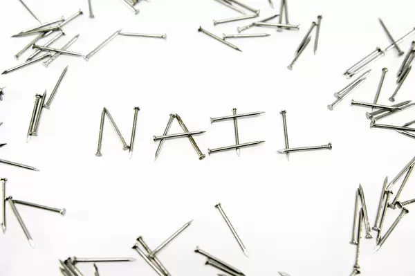 Nails forming the word NAIL