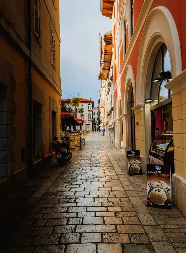 Narrow street in the historic centre, Porec, Istria, Croatia