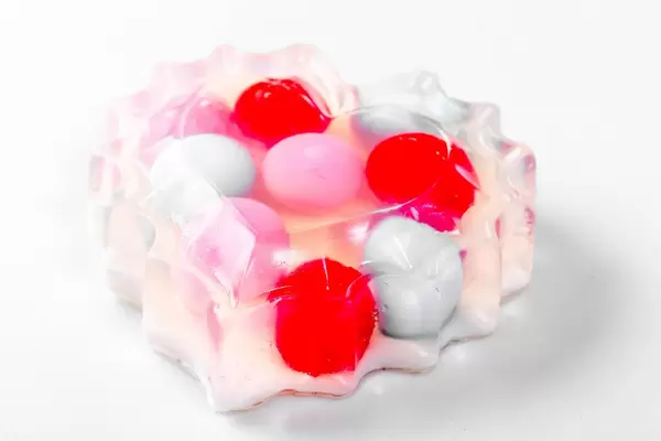 Natural soap heart shaped on light background