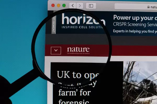 Nature logo under magnifying glass