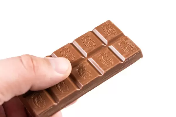 Nelly Chocolate Bar in the hand