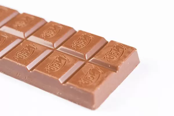 Nelly Chocolate Bar isolated above white background (Flip 2019)