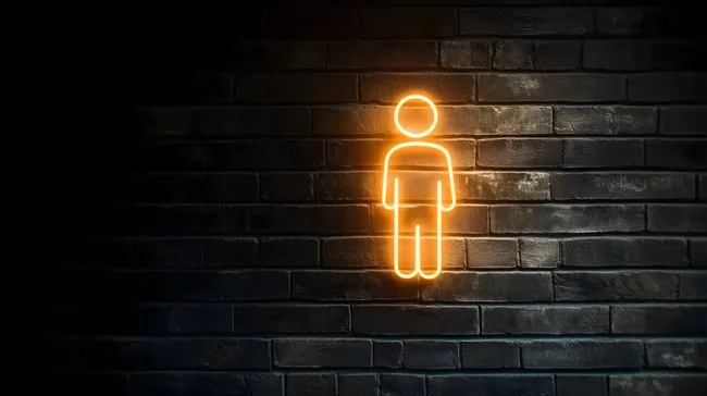 Neon-Mensch-Symbol an dunkler Backsteinwand