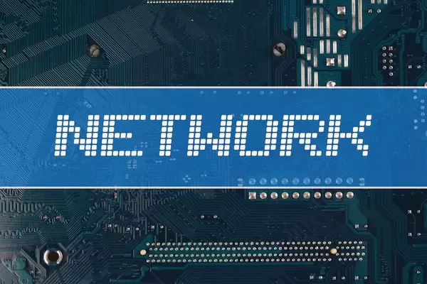 Network text over electronic circuit board background