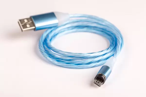 New USB cable on white background