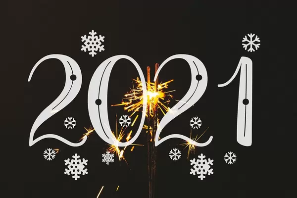 New year 2021 with sparkler on black background