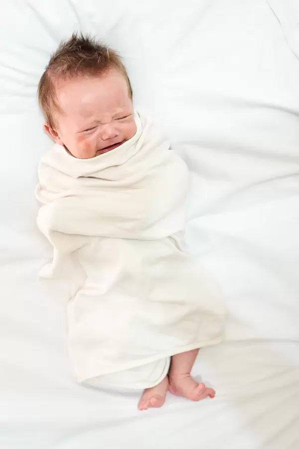 Newborn baby boy crying