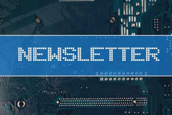Newsletter text over electronic circuit board background
