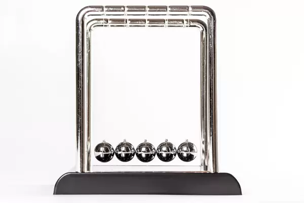 Newton's cradle on white background