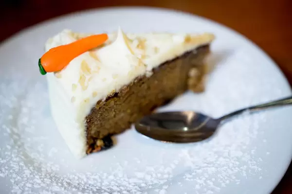 Nicely decorated slice of carrot cake
