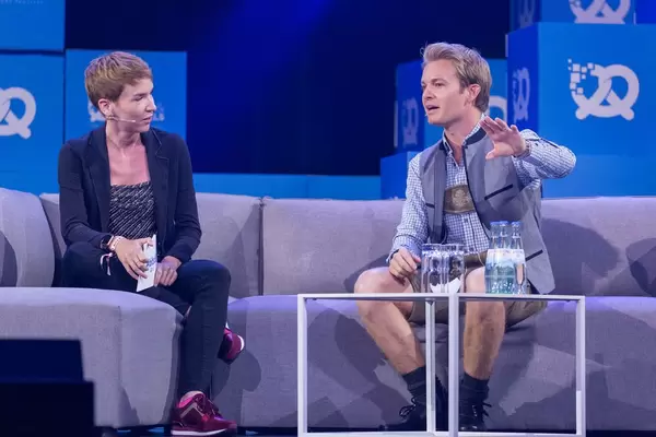 Nico Rosberg talking to interviewer at the Bits & Pretzels Festival 2018