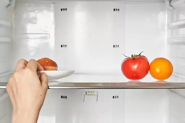 Night eating syndrome - A person choosing food