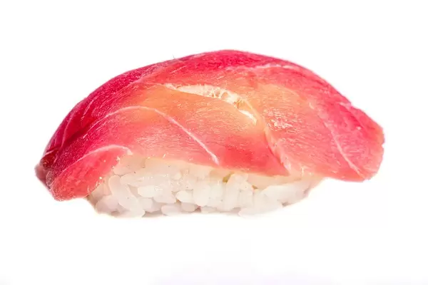 Nigiri with tuna on a white background