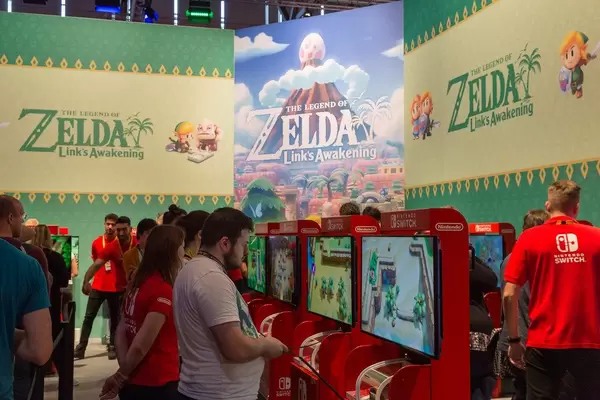 Nintendo Switch games fair station at Gamescom in Cologne, Germany: People testing and playing The Legend of Zelda - Link's Awakening