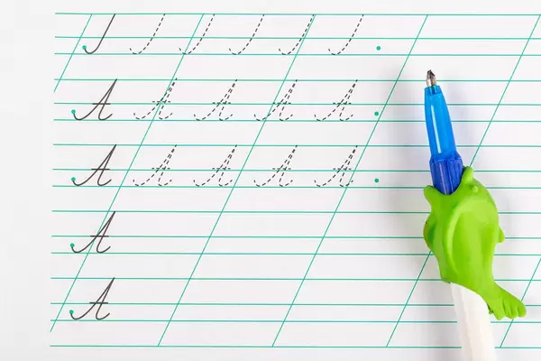 Notebook for teaching children to write letters and pen