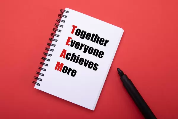Notebook with Together Everyone Achieves More text