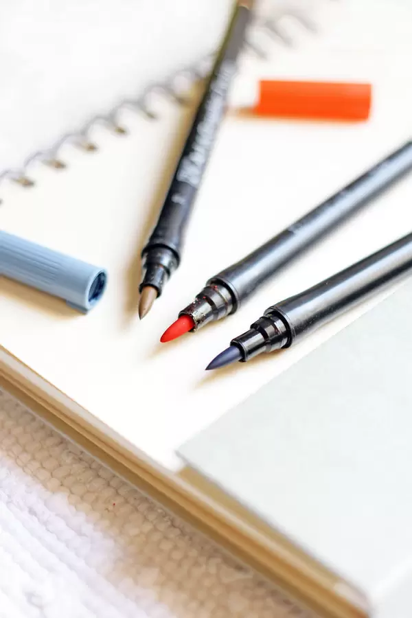 Notizblock mit Stiften