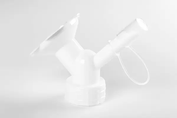 Nozzle for watering indoor plants