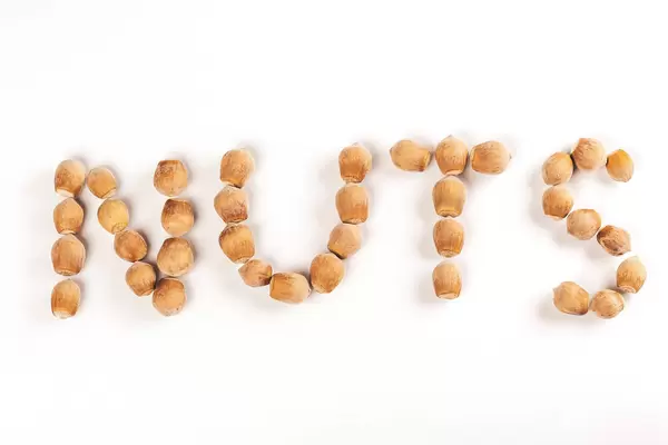 Nuts inscription made from hazelnuts