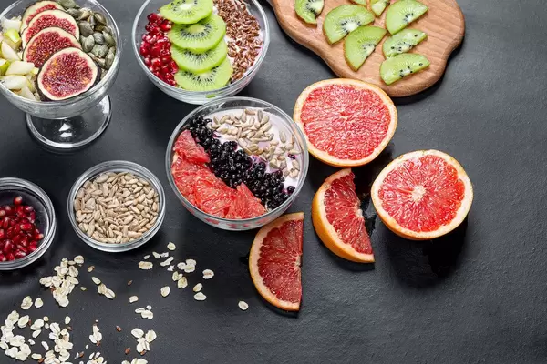 Oatmeal, fresh fruit and seeds. Healthy food, Breakfast concept (Flip 2019)