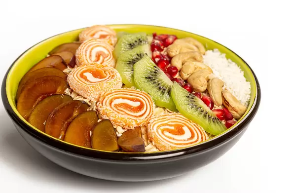 Oatmeal with fruit, turkish delight and cashews nuts