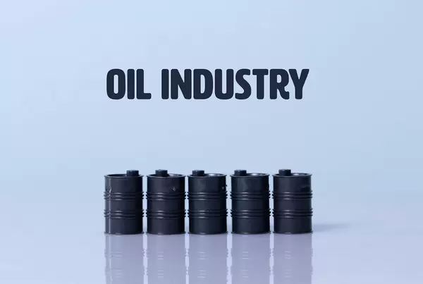 Oil barrels with Oil industry text
