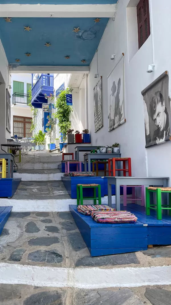 Oionos - The blue bar: live music bar in an alley of Skopelos with music posters and colourful furnishings