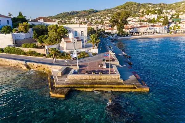 Old cannons from the revolution of 1821, on a viewing platform in front of the Agios Mamas church, on the sea coast of Saronic island Spetses, Greece