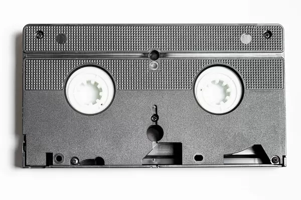Old film videocassette on a white background (Flip 2020)
