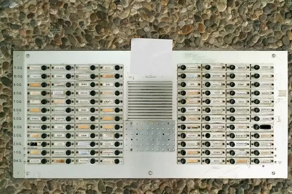 Old German intercom system at the entrance to 11 stories building