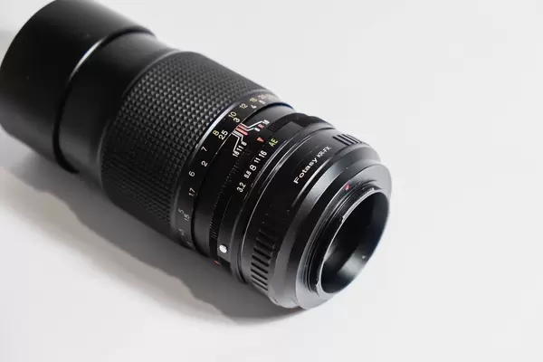Old lens on white background.jpg