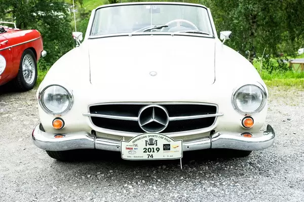 Old white Mercedes Benz car