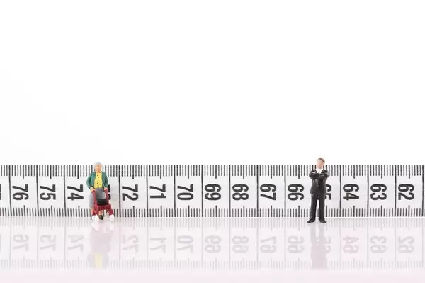Old women and businessman with measure tape on white background