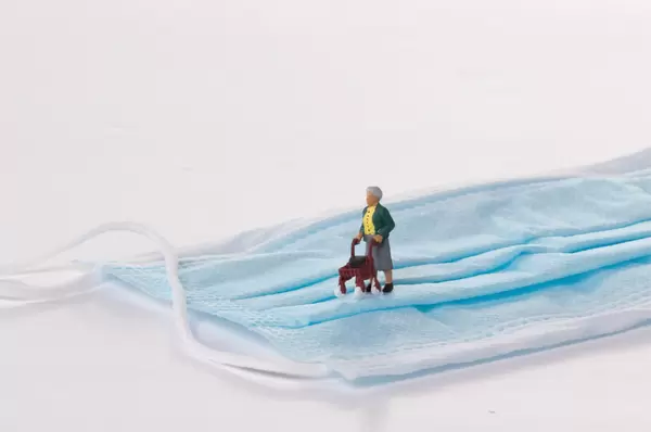 Older woman on medical face mask