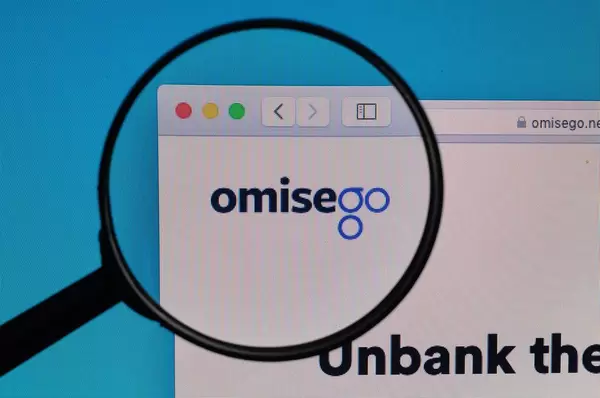 OmiseGO logo under magnifying glass
