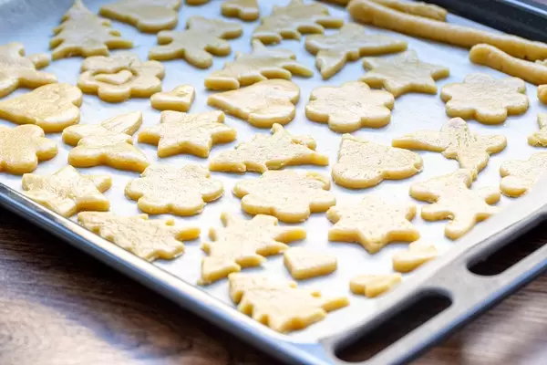 On a baking sheet raw cookies before sending it in the oven