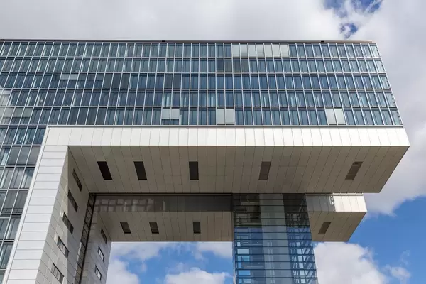 One of three Glass buildings called "Kranhaus", with architectural unicum crane shaped facade at "Rheinauhafen", in Cologne Germany