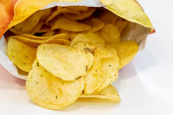 Open a package of potato chips