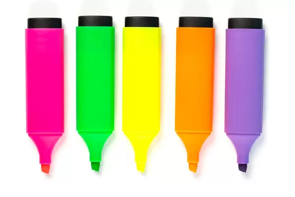 Open colored markers on white background