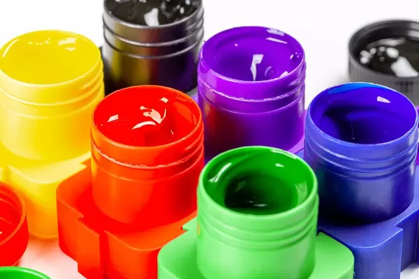 Open jars of paint for drawing, close-up (Flip 2020)