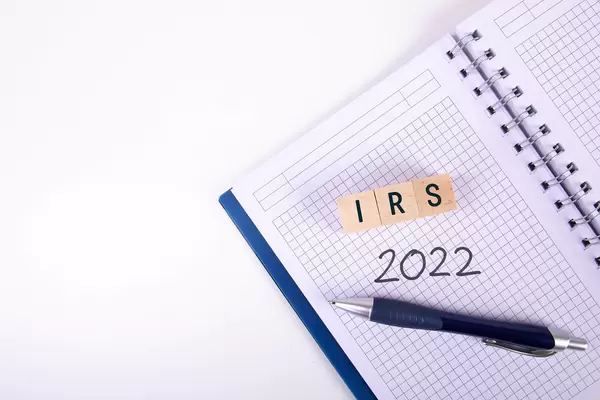 Open notebook with IRS 2022 text