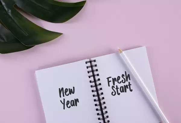 Open notebook with New Year and Fresh start text