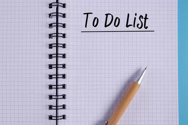 Open notebook with pen and To do List
