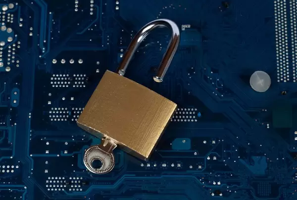 Open padlock on computer parts (Flip 2019)