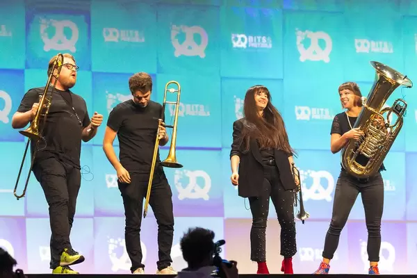 Opening of the German founder's conference Bits & Pretzels with small brass band on stage
