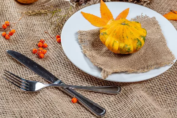 Option table setting for the autumn holidays. Halloween and Thanksgiving concept