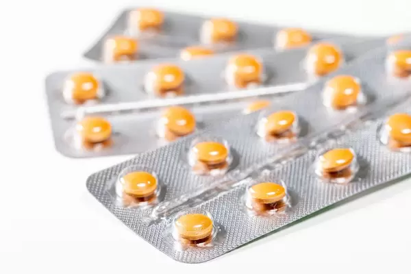 Orange pills close up. The concept of medicine, pharmacology (Flip 2019)