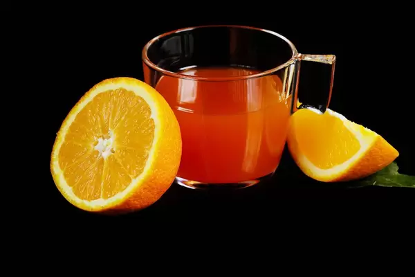 Orange Punch, German drink on black background