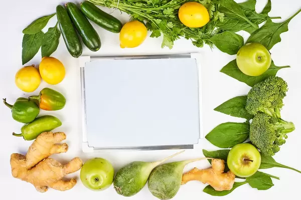 Organic detox fruits and vegetables with whiteboard